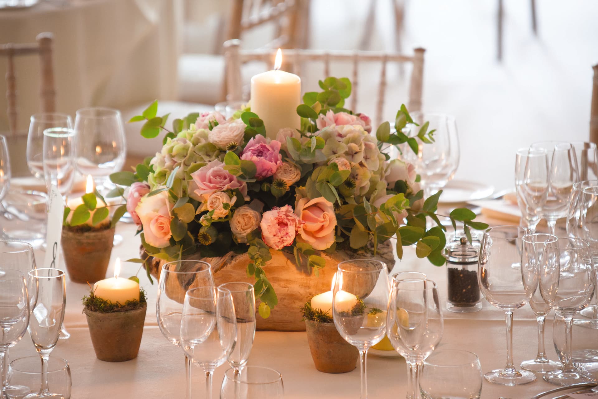 Flowers and candles on a wedding table at Darwin Lake